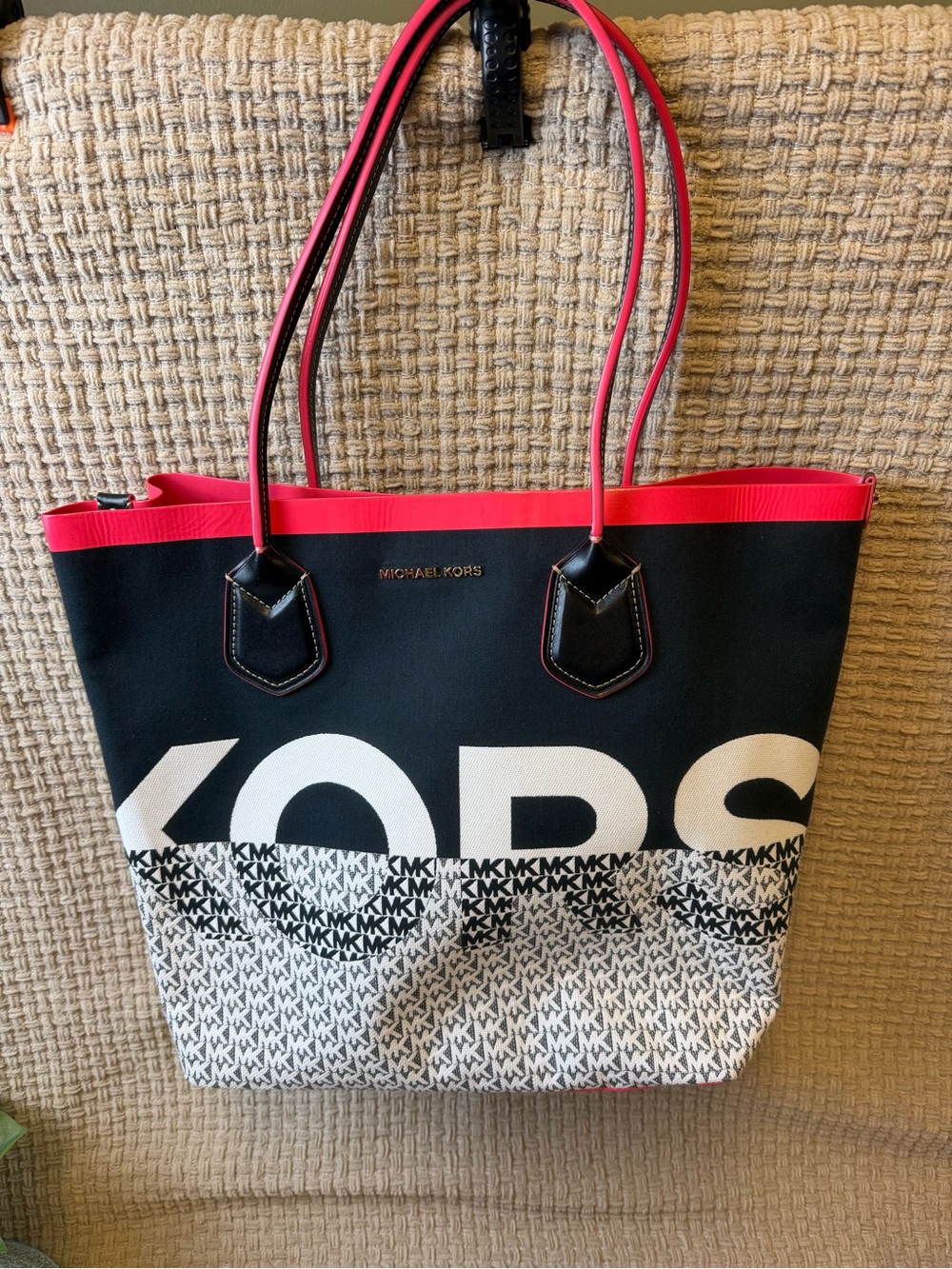 Michael Kors Black Tote with Pink Trim and White Logo